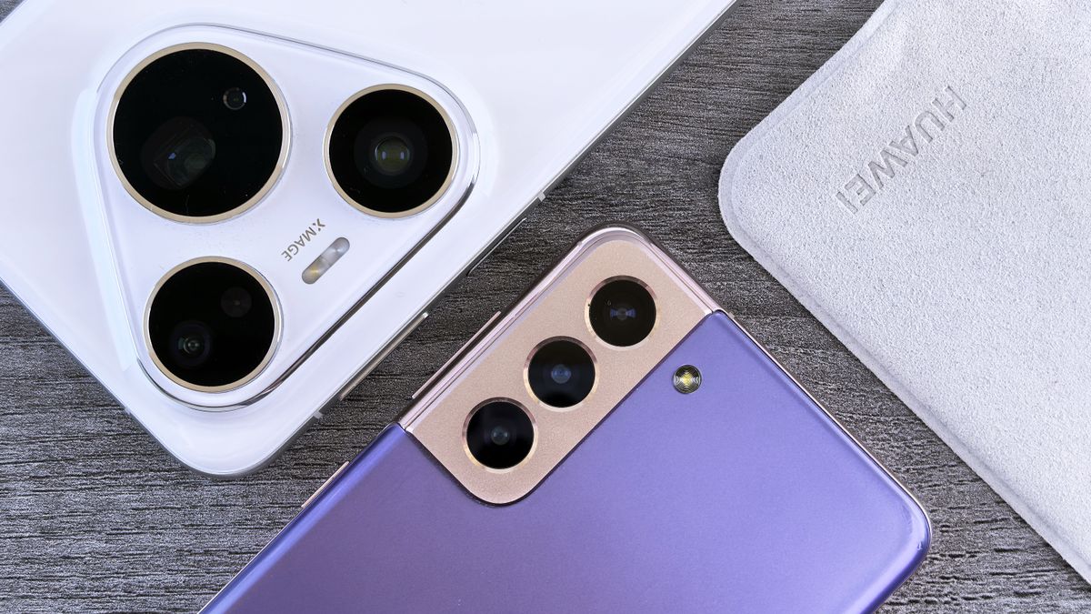 スマホを持つ人と通信のイメージ